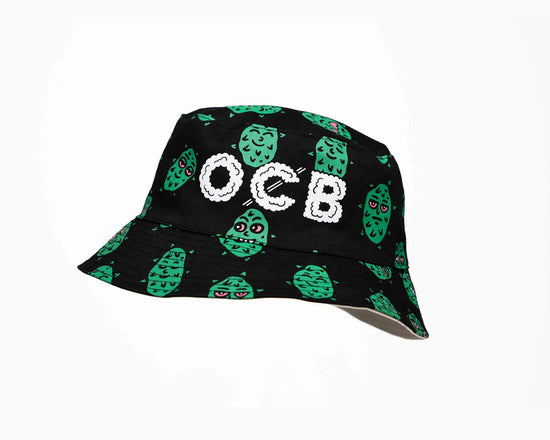 Black bucket hat with green pattern and 'OCB' text on a white background