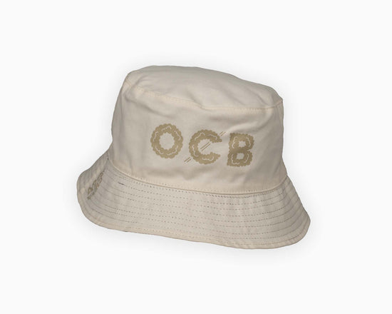 Beige bucket hat with 'OCB' branding on a white background